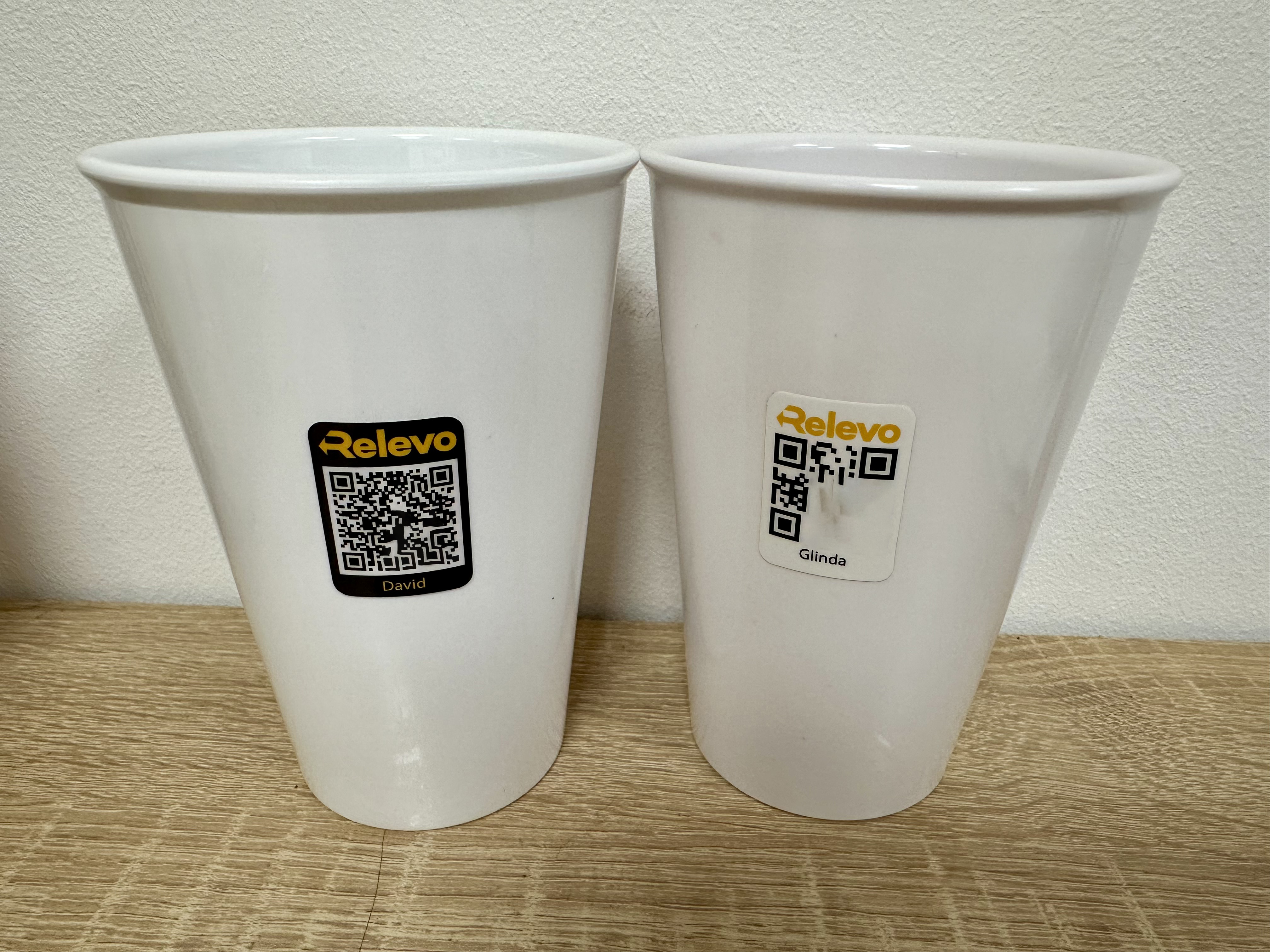 Relevo Cups with black and white QR code stickers